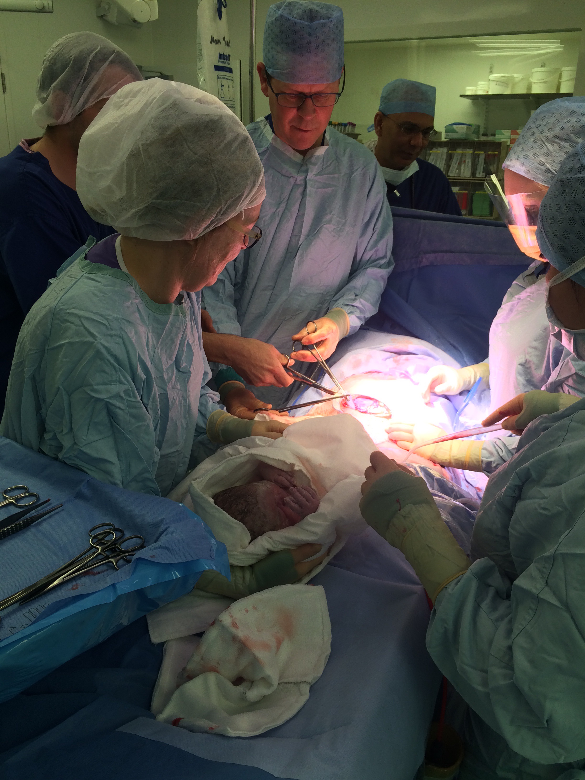 Daddy cutting the cord